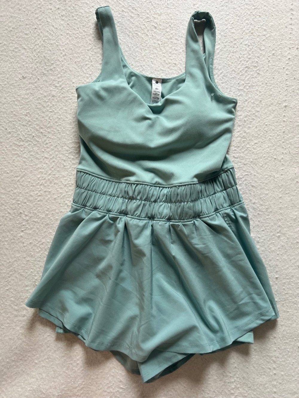 New NWT Yogalicious Lux Patient Romper Aquifer Blue Green Sz XS